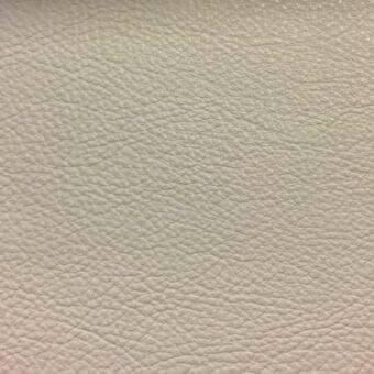 Light beige full-grain leather texture with a repeating pebble-grain pattern and matte finish, labeled Rugiano smooth leather s5004.